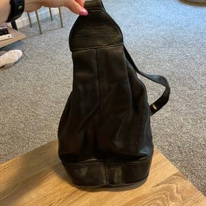 Perlina black leather sling backpack